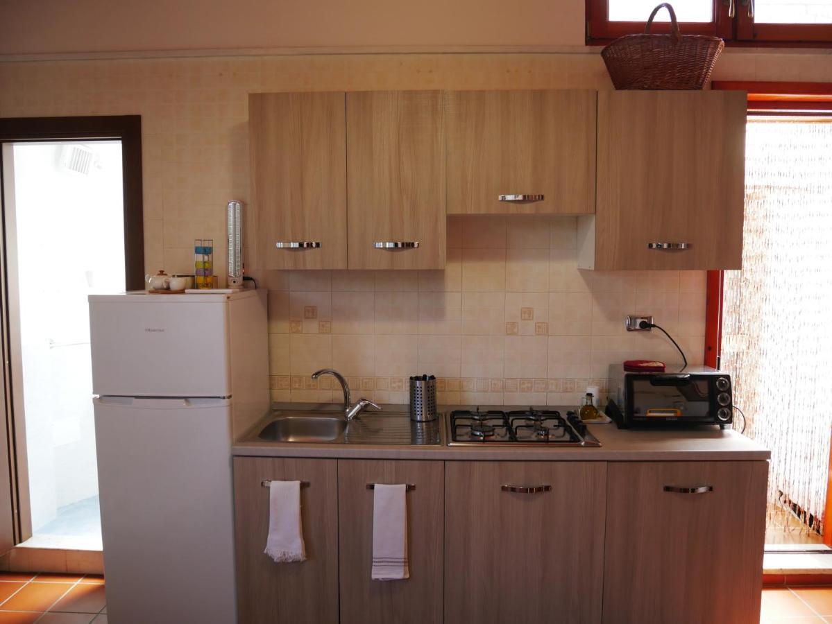 Olindo Apartment E Cristina Apartments Вико Екуензе Екстериор снимка